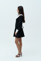 Black dress with white collar