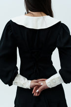 Black dress with white collar